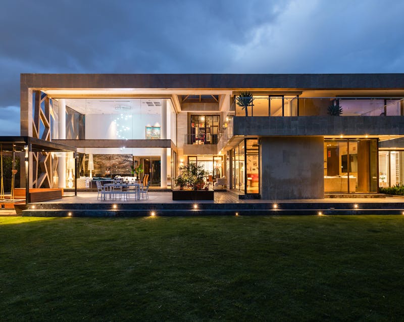 a beautiful home with outdoor lighting
